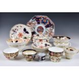 A collection of 19th century Staffordshire Imari pattern dinnerware and other Imari pieces,