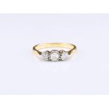 An 18ct gold and diamond trilogy ring, set with single cut diamonds totalling approx. 0.22ct, ring