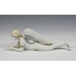 A large Lladro 'Precious Angel' figurine, number 8438, designed by Ernest Massuet, 16 ¾in. (42.7cm.)
