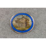 A Victorian micro mosaic brooch, within an 18ct gold surround, depicting a classical temple, approx.