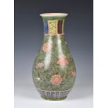 A Chinese famille verte lotus vase, probably early 20th century, ovoid form, painted with lotus