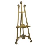 A French painted Louis XV style artist's easel, probably early 20th century, the grey-green