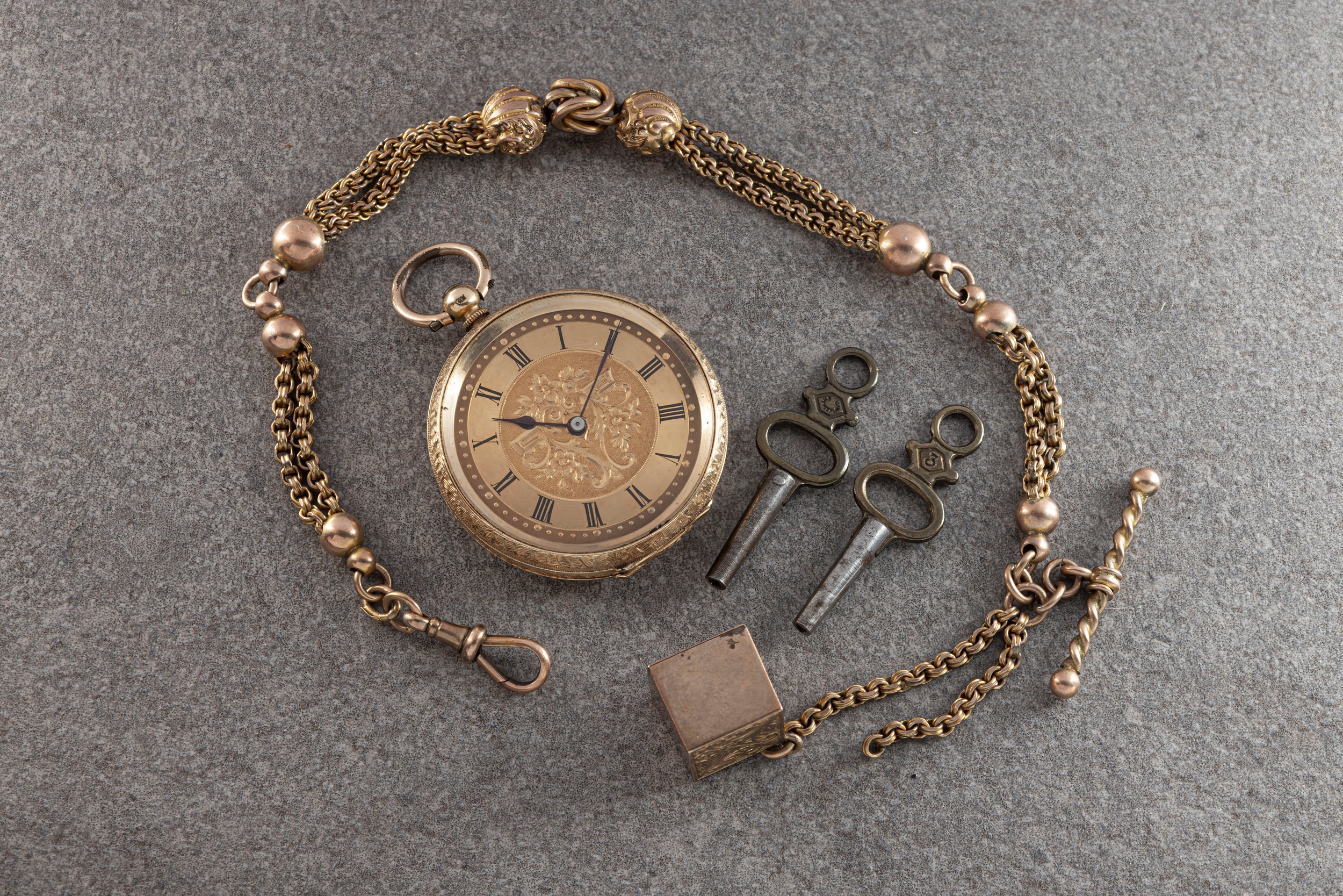 A Swiss 18ct gold fob watch, late 19th / early 20th century, with unsigned gilt lever movement,