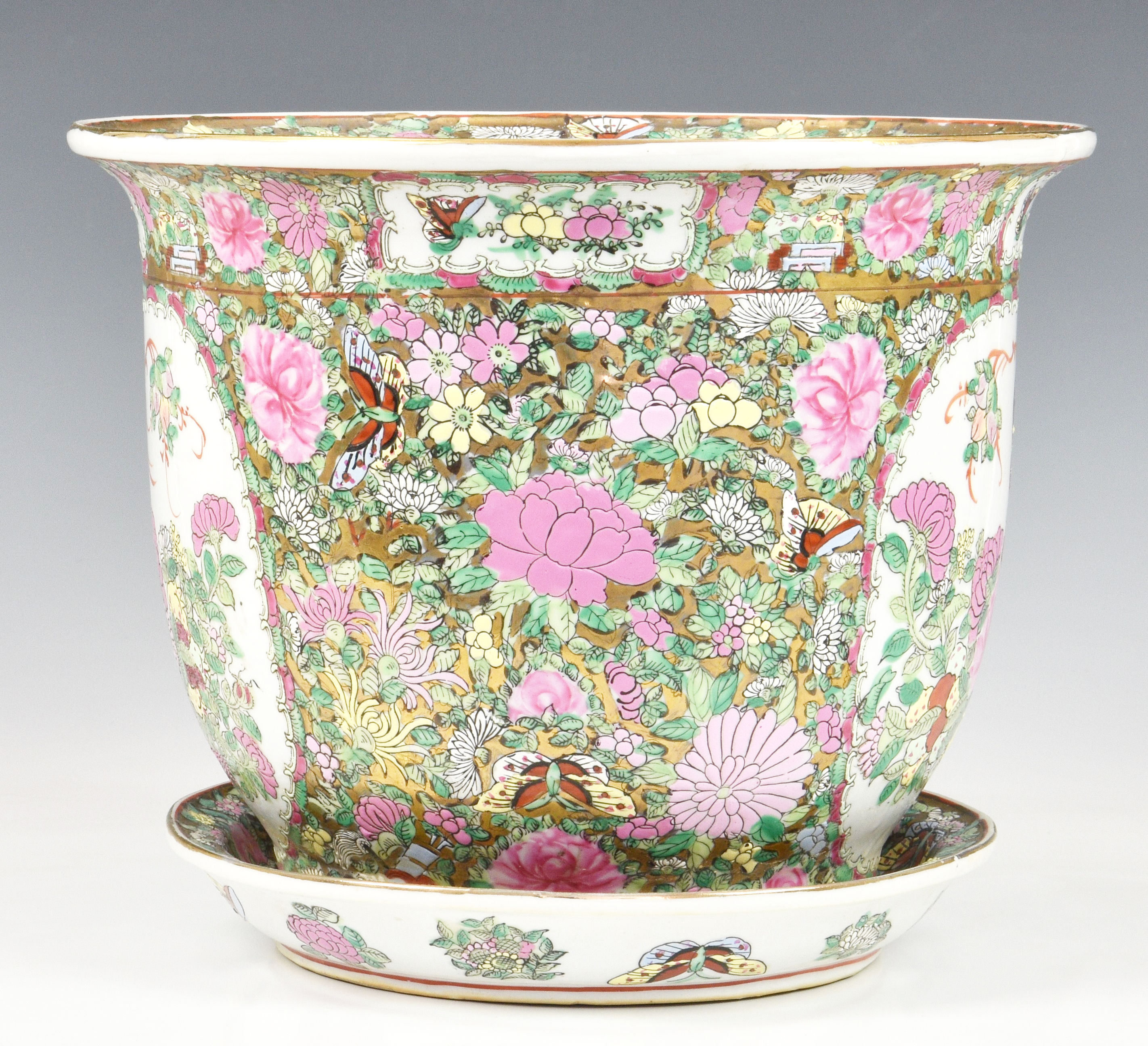 A Chinese famille rose jardiniere and saucer, 20th century, painted with two reserves with - Image 2 of 6