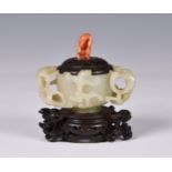 A Chinese carved pale celadon jade chilong cup, probably Qianlong period (1736-1795), the vessel