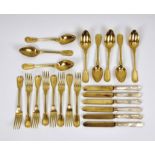 A part dessert set of gilt metal flatware by Christofle, c.1850, comprising of eight forks, one