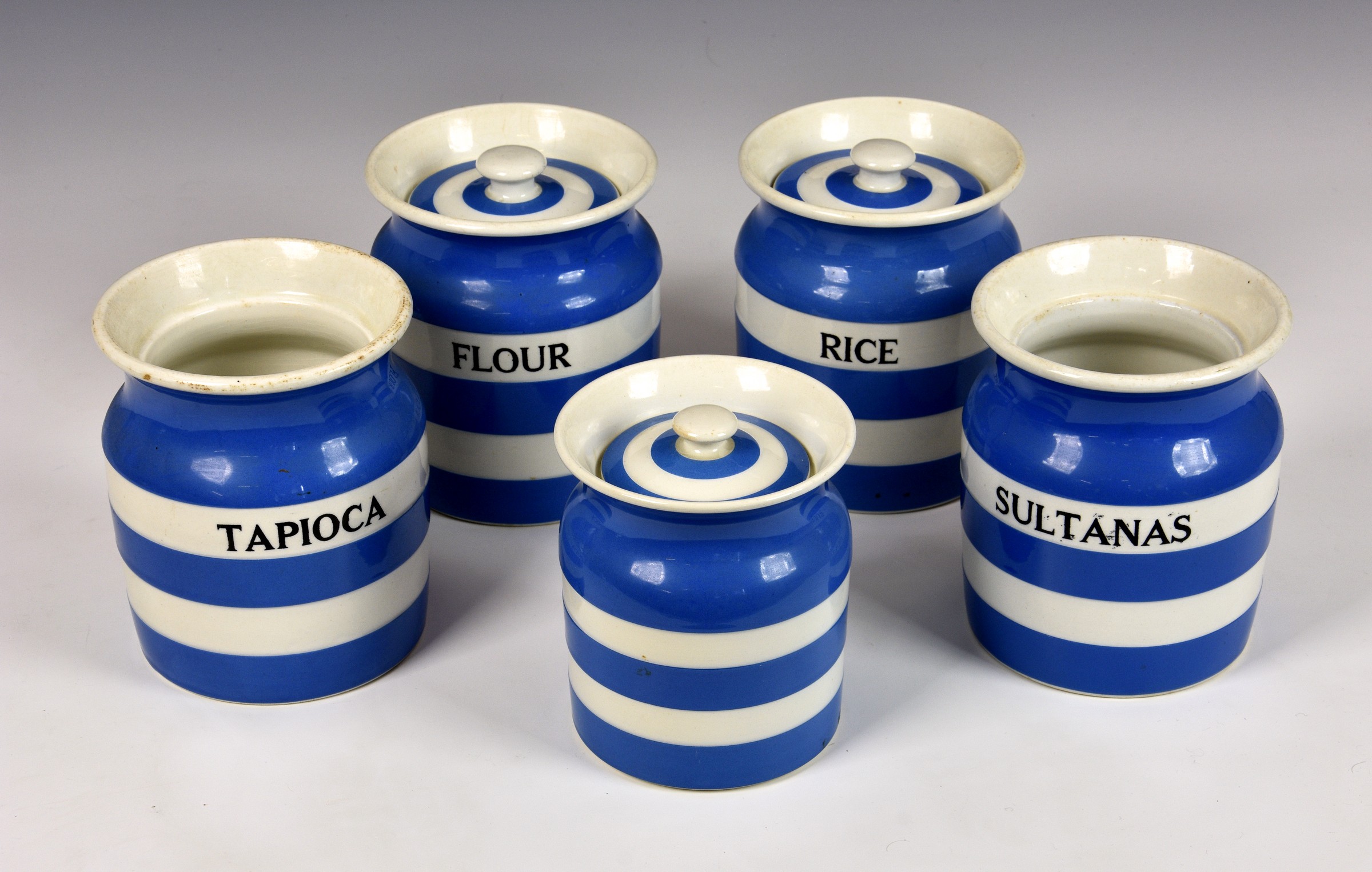 Five assorted T. G. Green & Co Ltd Cornish Kitchen Ware storage canisters, having typical blue and