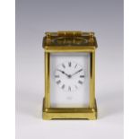 A late 19th century brass carriage clock by Richard & Co, Paris,, retailed by John Walker, 230