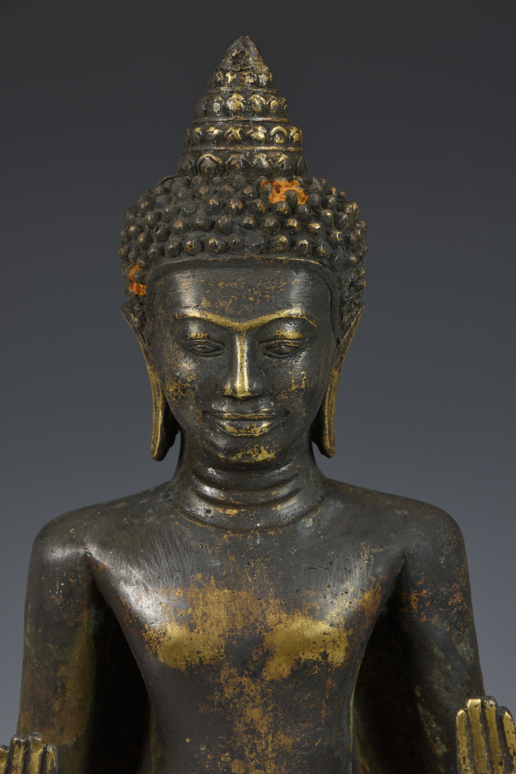 A gilt and black-lacquered figure of Buddha Shakyamuni, Thailand, cast metal Buddha, standing in - Image 2 of 9