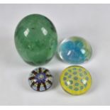 A collection of glass paperweights, to include a Clichy style millefiori paperweight, 2 3/8in. (