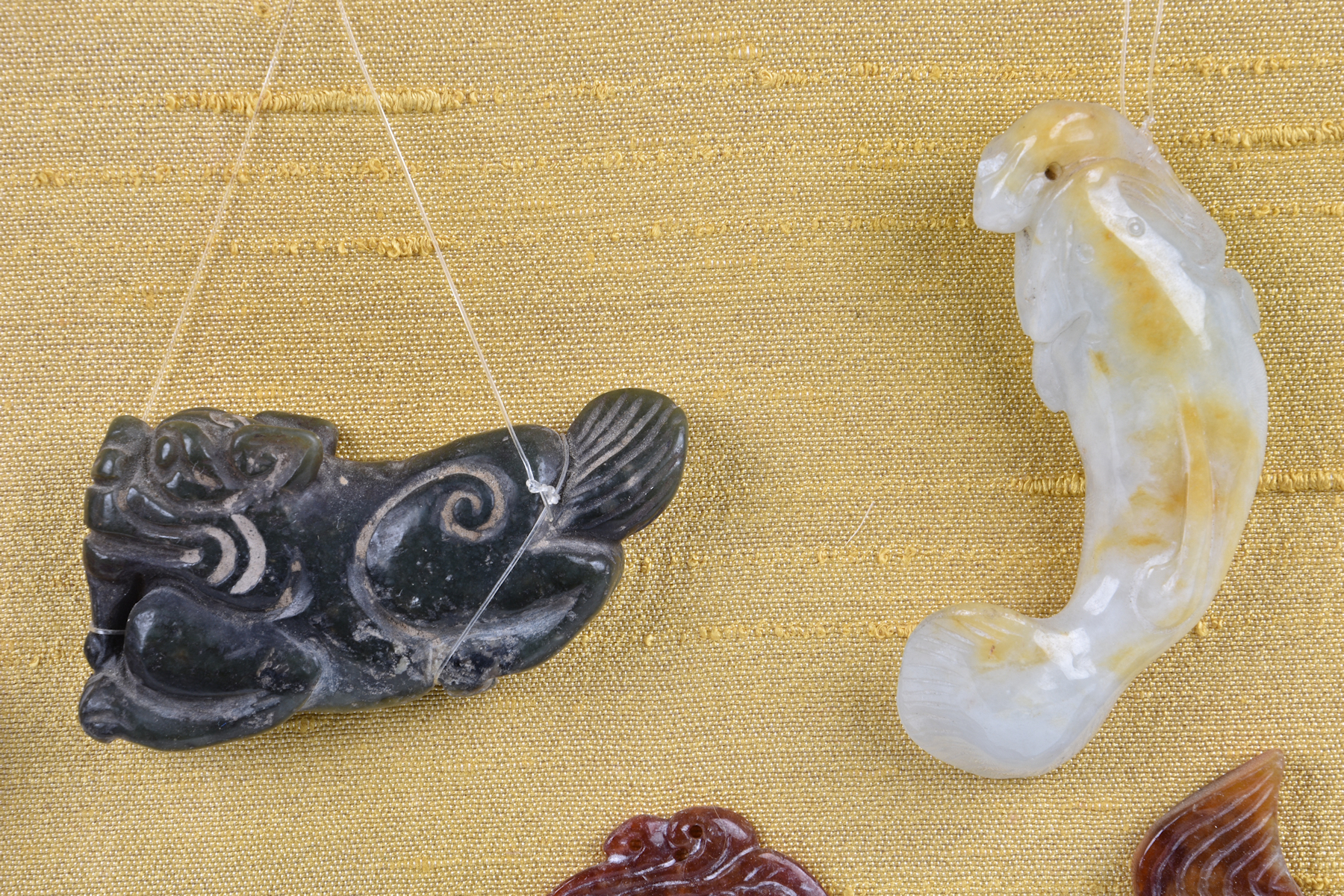 A small collection of modern Chinese jade and stone carvings, to include various fish in different - Image 7 of 11