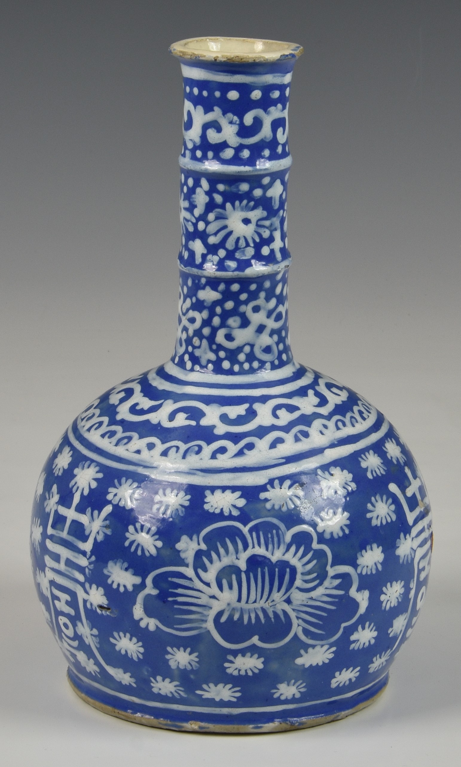 A Chinese slip decorated blue glazed stoneware bottle vase, probably 19th century, the cylindrical - Image 2 of 3