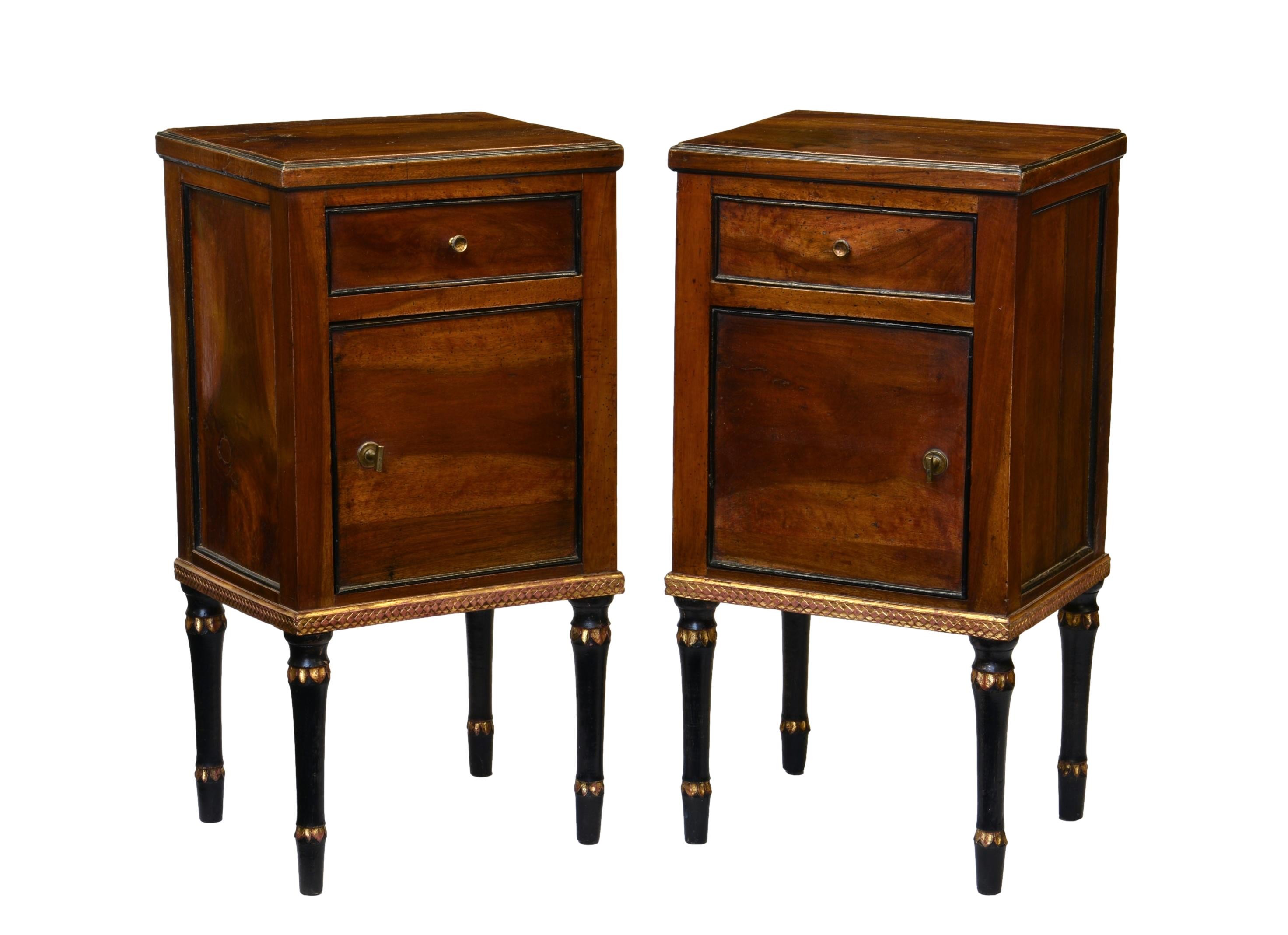 A pair of French Louis XVI walnut, ebonised and parcel gilt bedside cabinets, with a single drawer