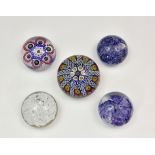 A Strathearn millefiori and spiral air twist domed glass paperweight, large spoke, 3in. (7.6cm.)