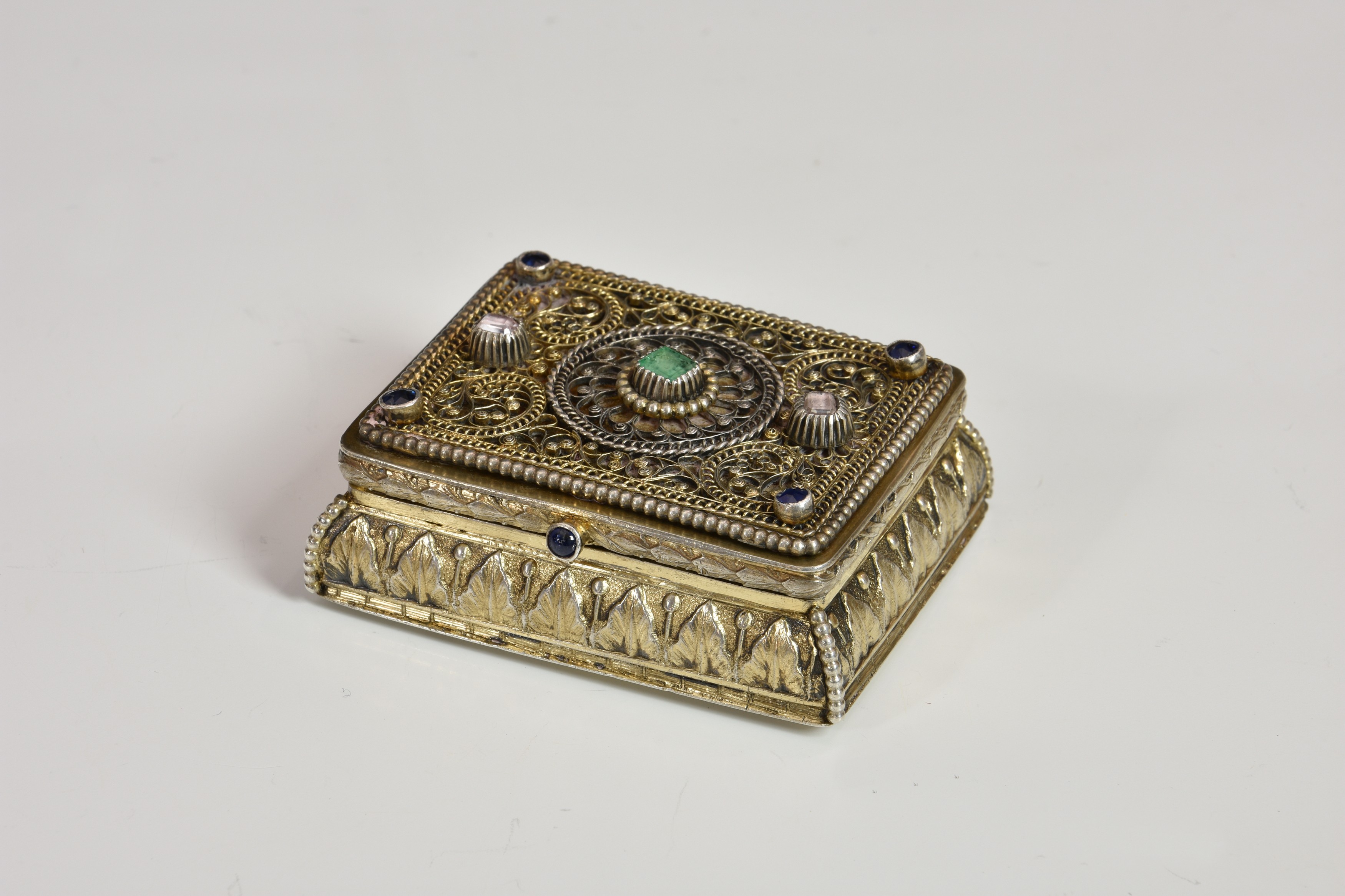 An Indian or Persian silver gilt and jewelled snuff box, 19th century, impressed marks to base and