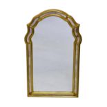 A Georgian style giltwood mirror, late 20th century, the serpentine arched two-part frame around a