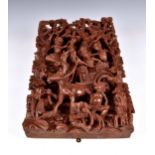 A Thai relief carved wooden panel, depicting figures on chariot and wise monkeys in forest scene, 19