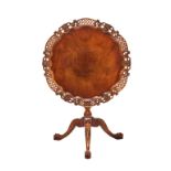 A George II style mahogany tilt-top tripod table on a birdcage mechanism, late 20th century, the