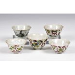 Five Chinese porcelain famille rose bowls, early 20th century, comprising two enamelled with