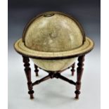 A Smith's library table terrestrial globe, 20th century, 12in. (30.4cm.) the sphere applied with