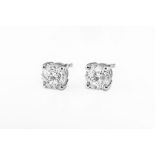 A pair of diamond earstuds, each set with a brilliant-cut diamond, mounted in 18ct white gold,