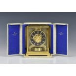 A Jaeger-LeCoultre "Atmos" mantel clock, Swiss, late 20th century, with brass and glass case of