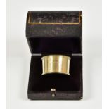 A cased 18ct yellow gold napkin ring, maker's mark 'W.W', of typical form with raised and reeded