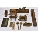 A large collection of various antique woodworking planes, of varying forms, to include jack,