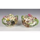 A pair of Minton porcelain flower-encrusted twin handled pots and covers, circa 1825, each painted