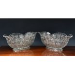 A pair of large heavy moulded glass boat shaped vases / table centrepiece bowls, having pineapple