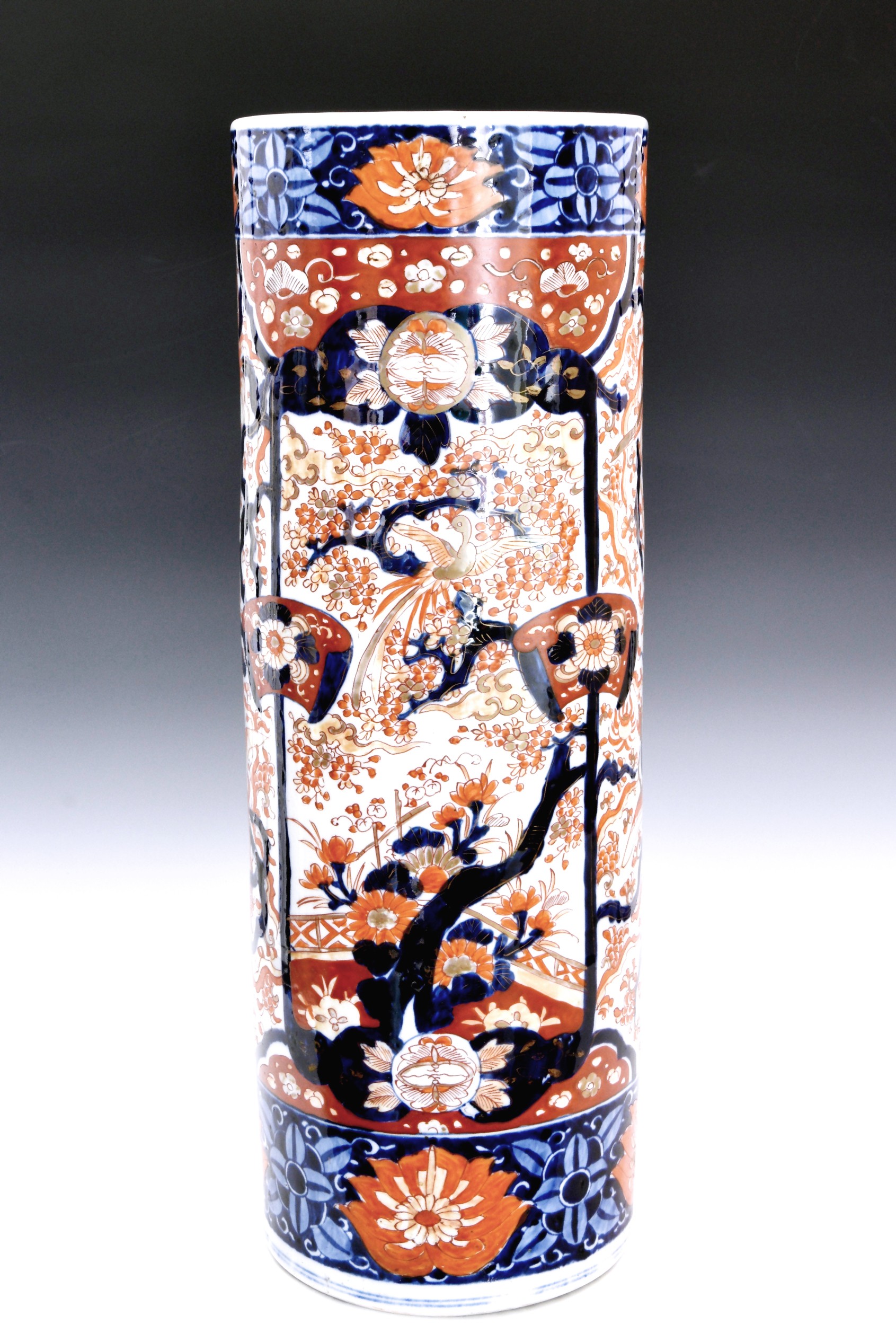A Japanese Imari cylindrical stick stand, probably late 19th century, typically decorated in