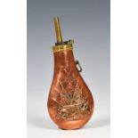 A Colt Navy type copper and brass powder flask