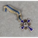 A German 'Der Deutschen Mutter' (German mothers cross) medal
