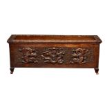 A Chinese carved teak dragon chest, early 20th century