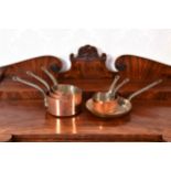 A graduated set of five French Villedieu copper saucepans