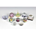 A collection of Selkirk Glass and other paperweights