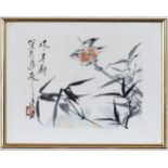 A Chinese print on paper of a Bird in Bamboo, signed and with stamp