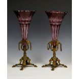 A pair of 19th century ruby cased glass and gilt metal vases
