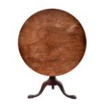 A George III mahogany tilt-top supper table