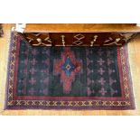 A Persian rug on black ground