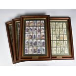 A collection of framed cigarette cards