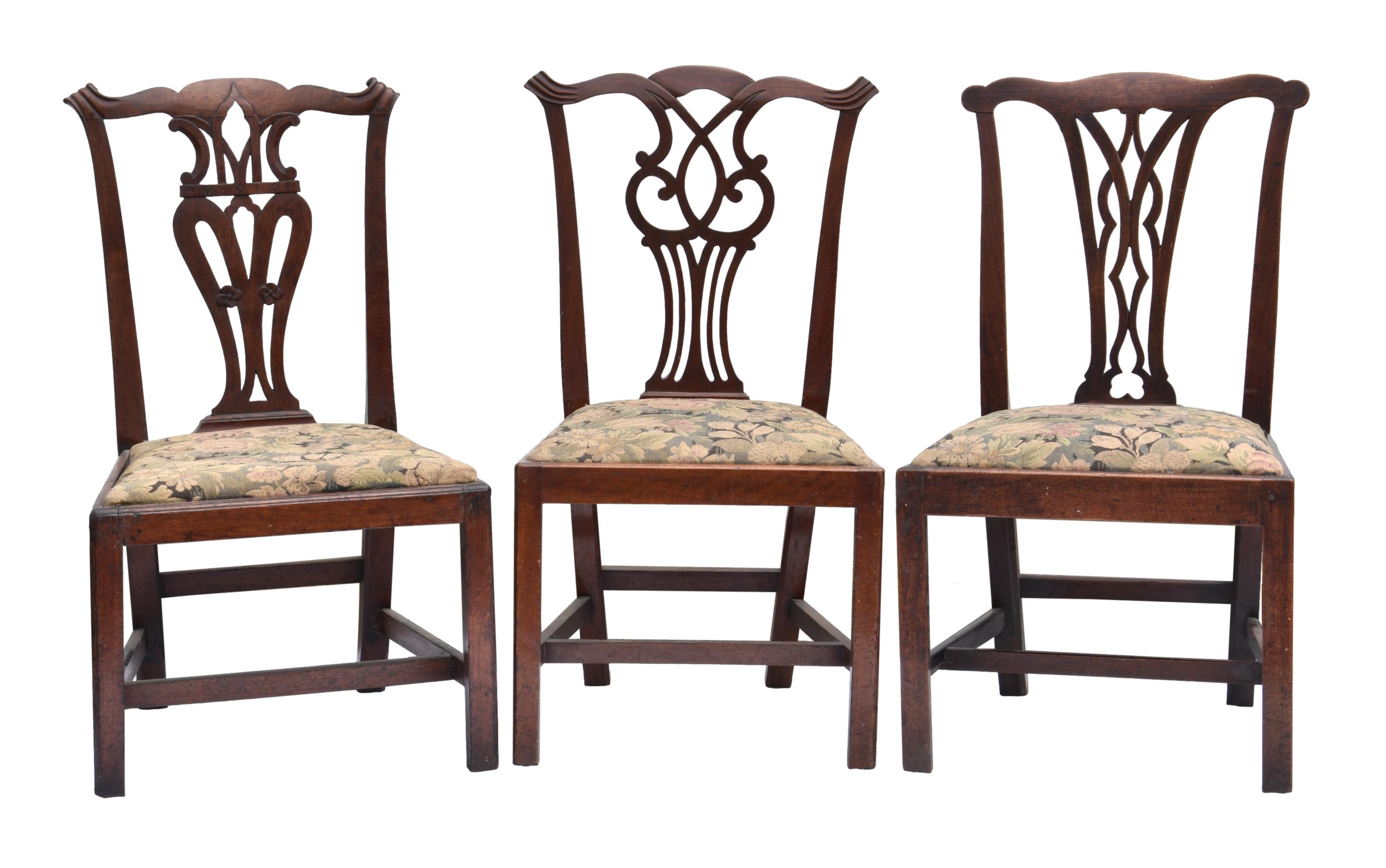 Three George III Chippendale style mahogany dining chairs