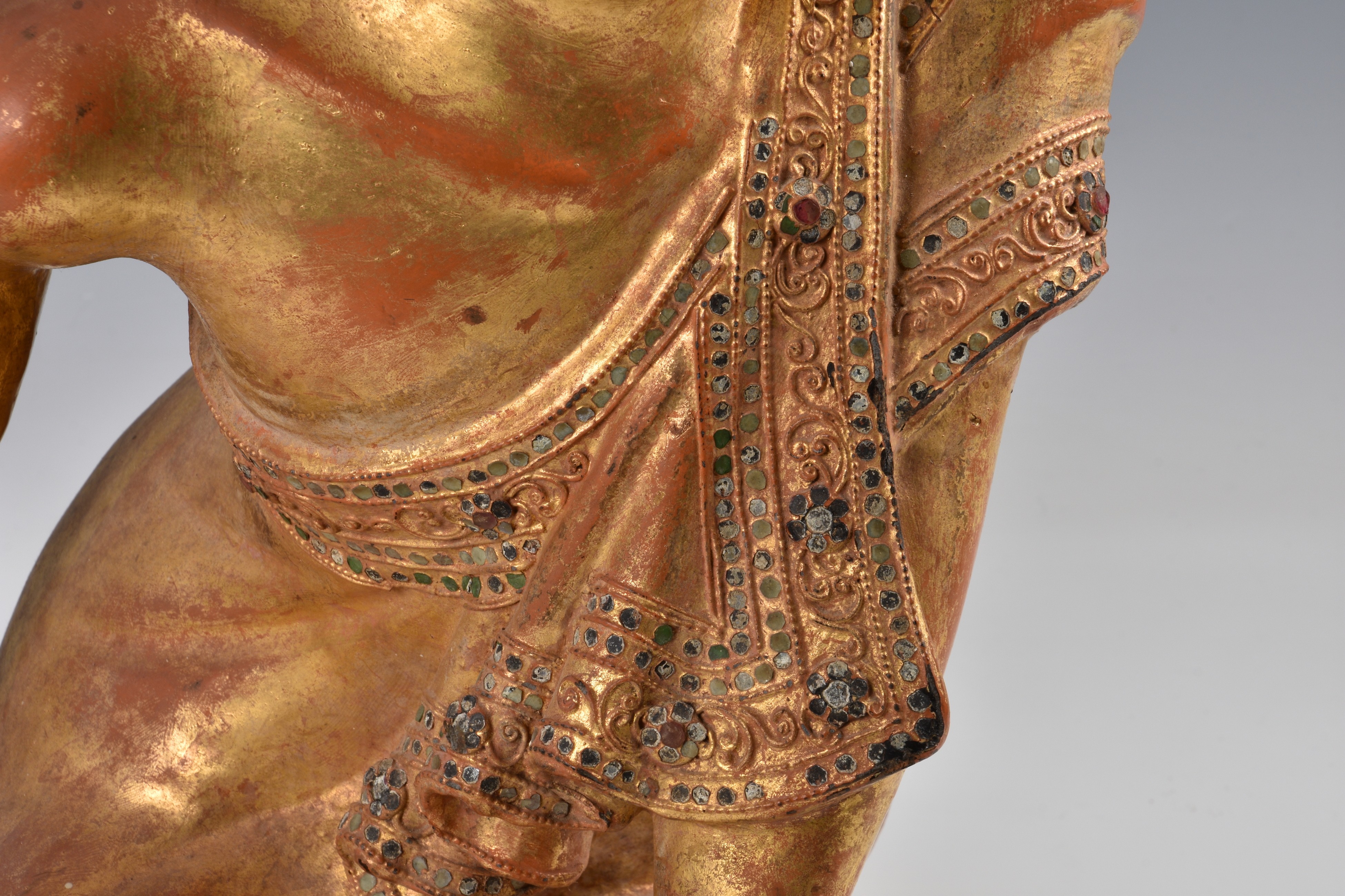 A Burmese Mandalay carved, lacquered and jewelled gilt wood figure of a seated monk, probably late - Image 4 of 9