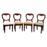 A set of four Victorian walnut balloon back chairs, two in matching pale green velour, the others