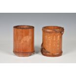 Two Chinese carved wooden brush pots, 20th century, one in bamboo, delicately carved with with a