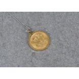 A 1913 gold half sovereign pendant necklace, the half sovereign in a removable 9ct pendant mount, on