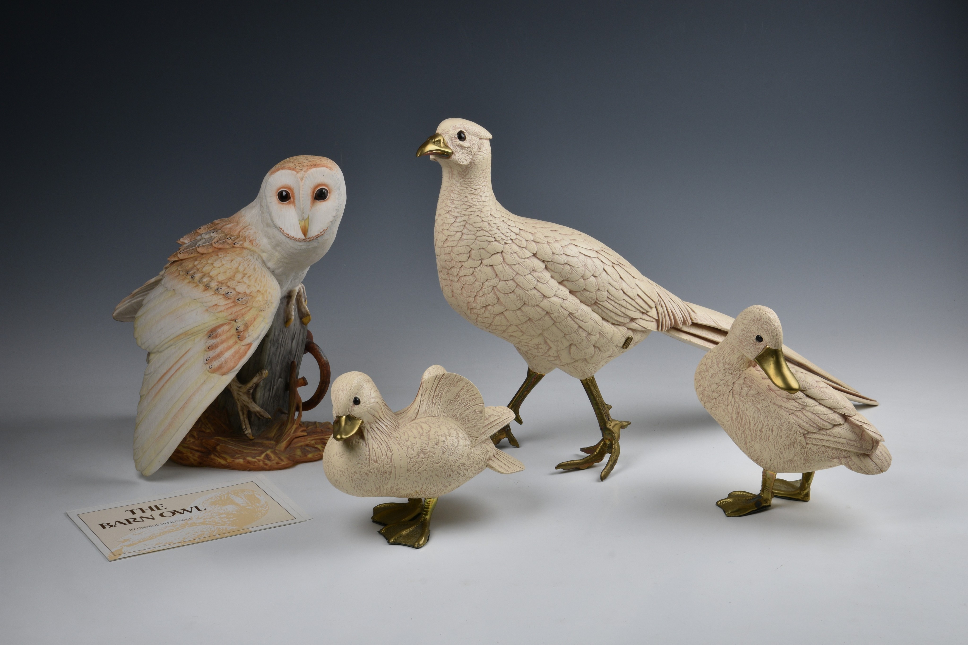 George McMonigle for Franklin Mint - a porcelain Barn Owl figure, c.1987, 9¾in. (24.75cm.) high;