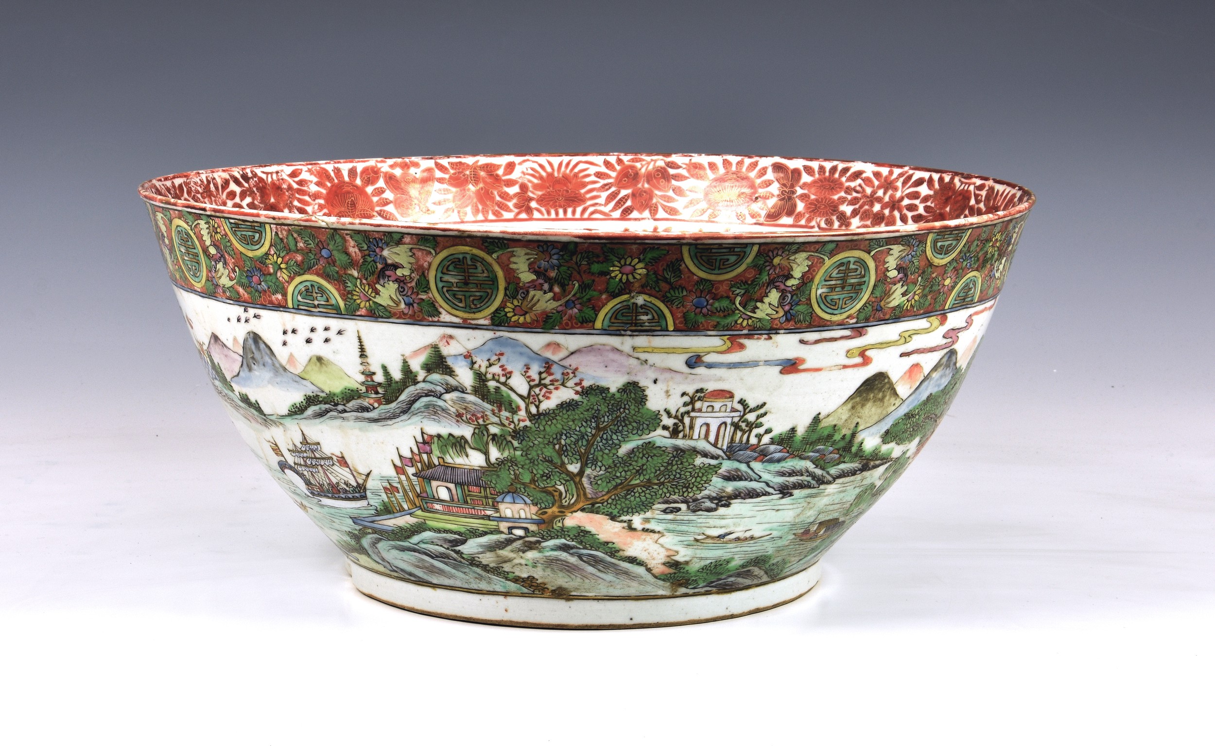 A large Chinese export porcelain Canton famille rose punch bowl, worn four character seal mark to