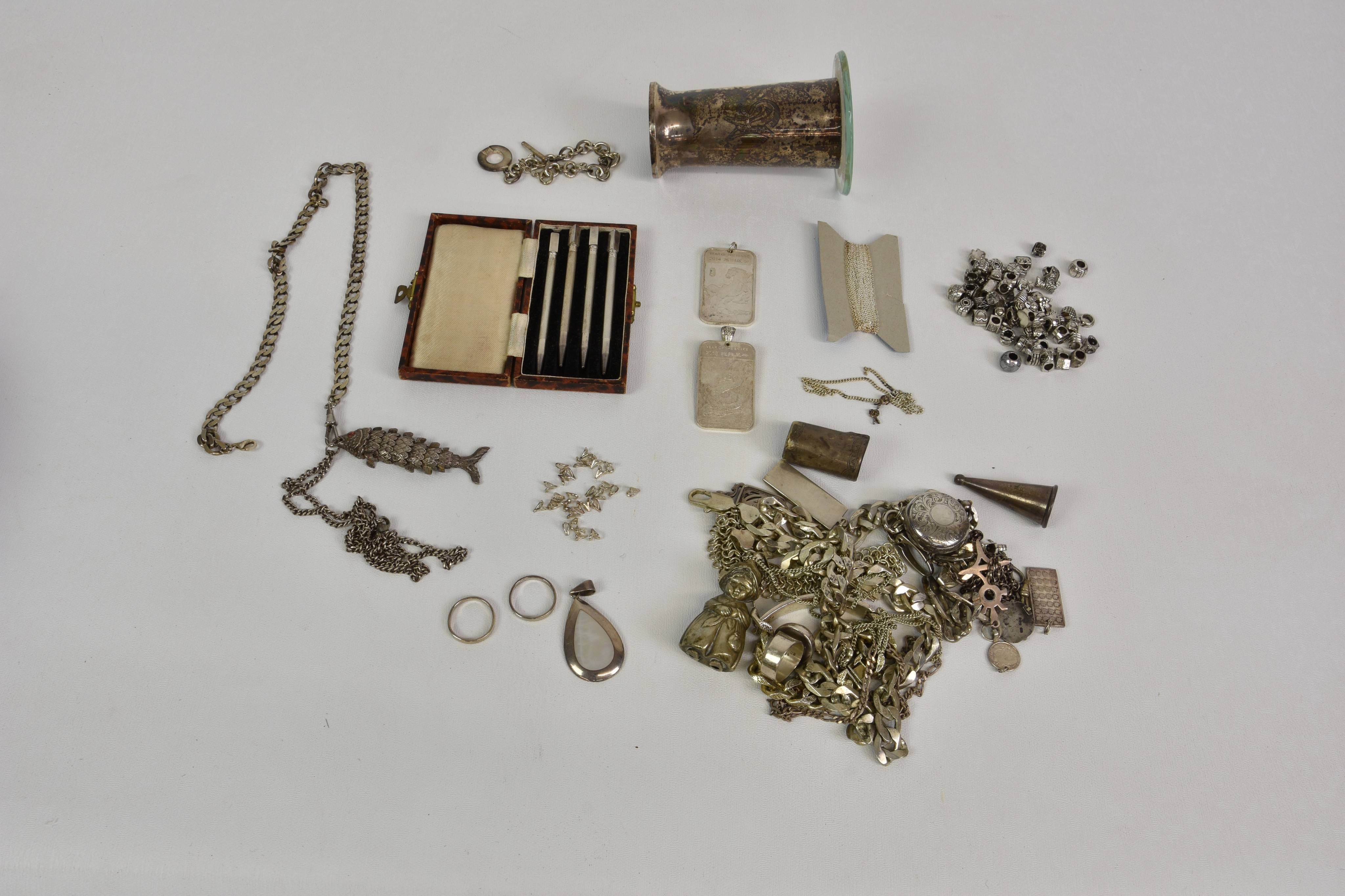A quantity of silver and white metal jewellery, including chains, bracelets, rings etc.; plus two