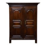 An 18th century oak and fruitwood two door panelled armoire, possibly Jersey